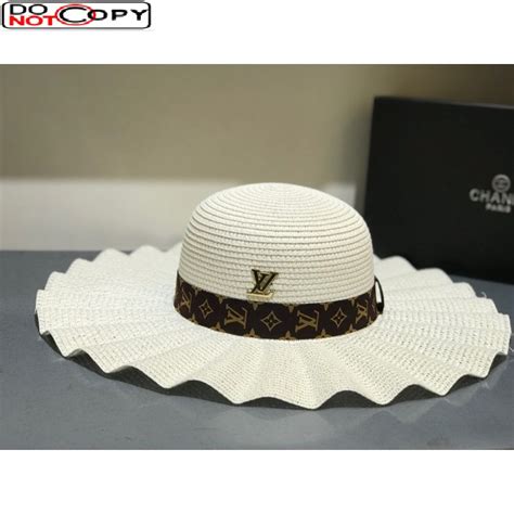 white louis vuitton hat.